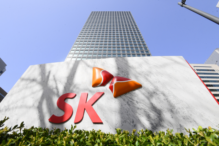 Tighter　rules　on　business　split-ups　may　benefit　SK　Inc.